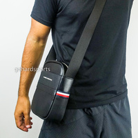 Tommy Hilfiger Small Reporter Bag in Black